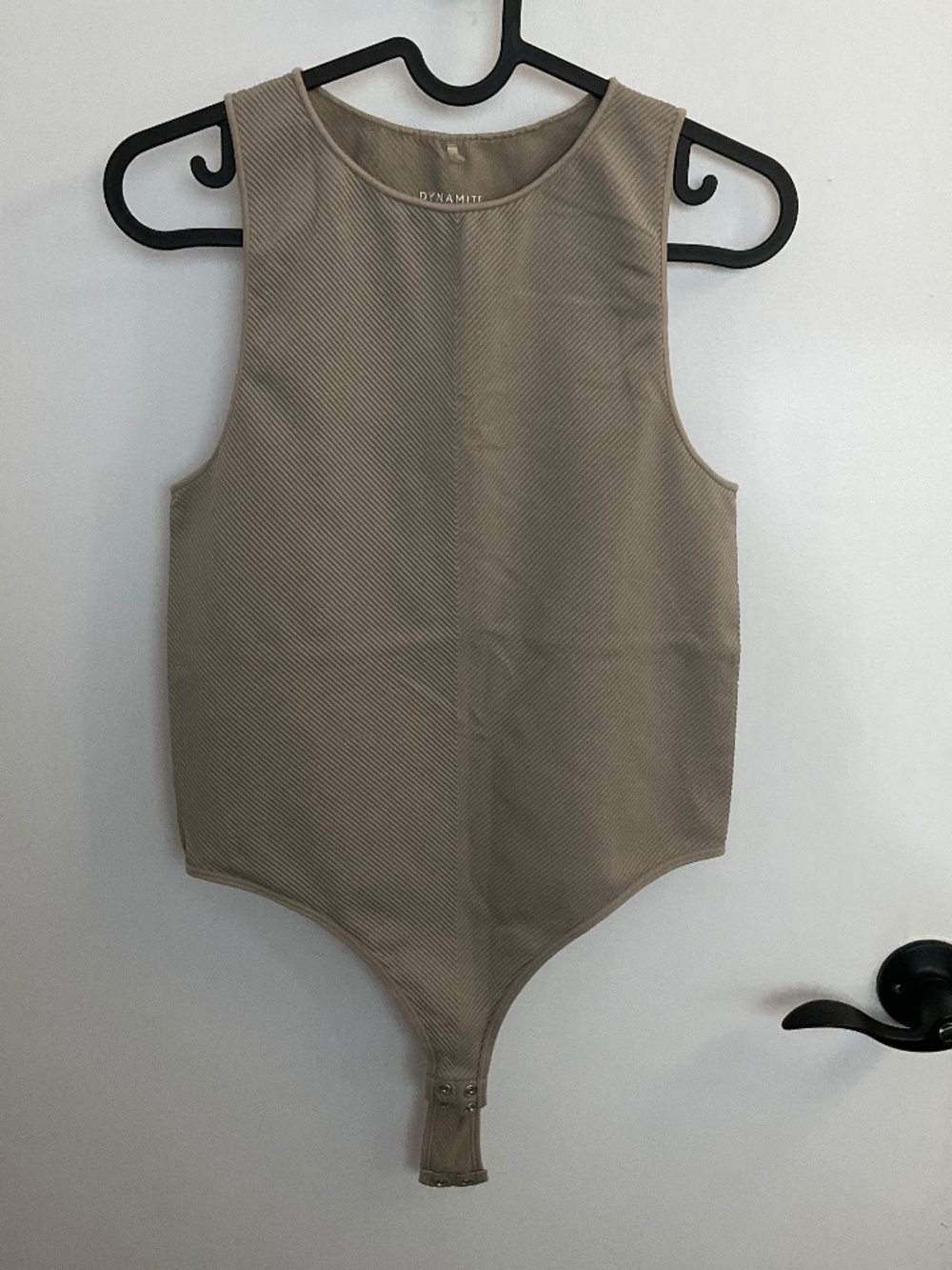 Textured bodysuit with a scoop neckline and snap button from Dynamite, medium
